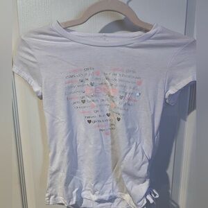 Bebe sport size 10/12 girls white top with pink and silver wording graphics.